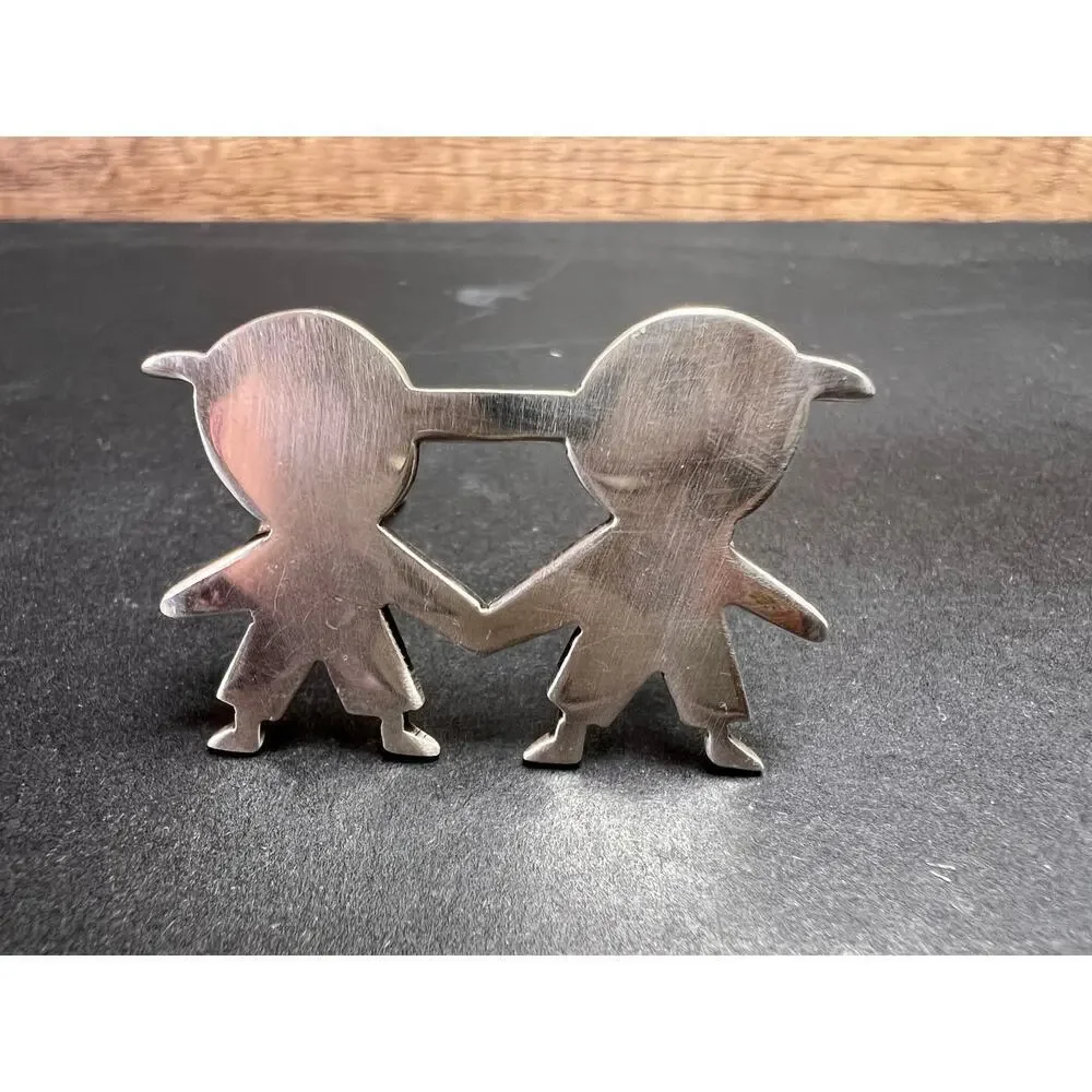 Vintage 925 Mexico sterling silver kids holding hands pin